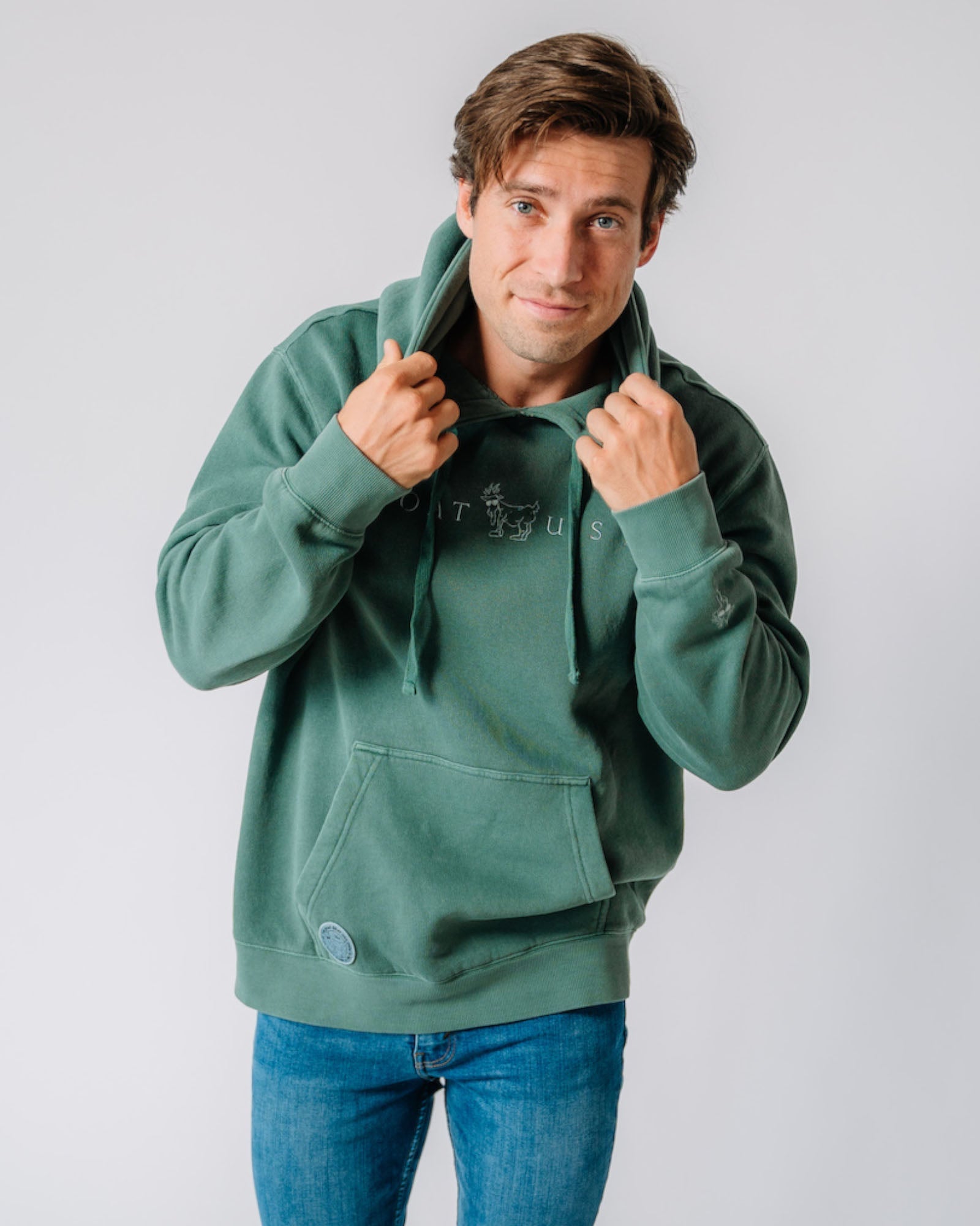 Model wearing alpine Linden Hooded Sweatshirt#color_alpine