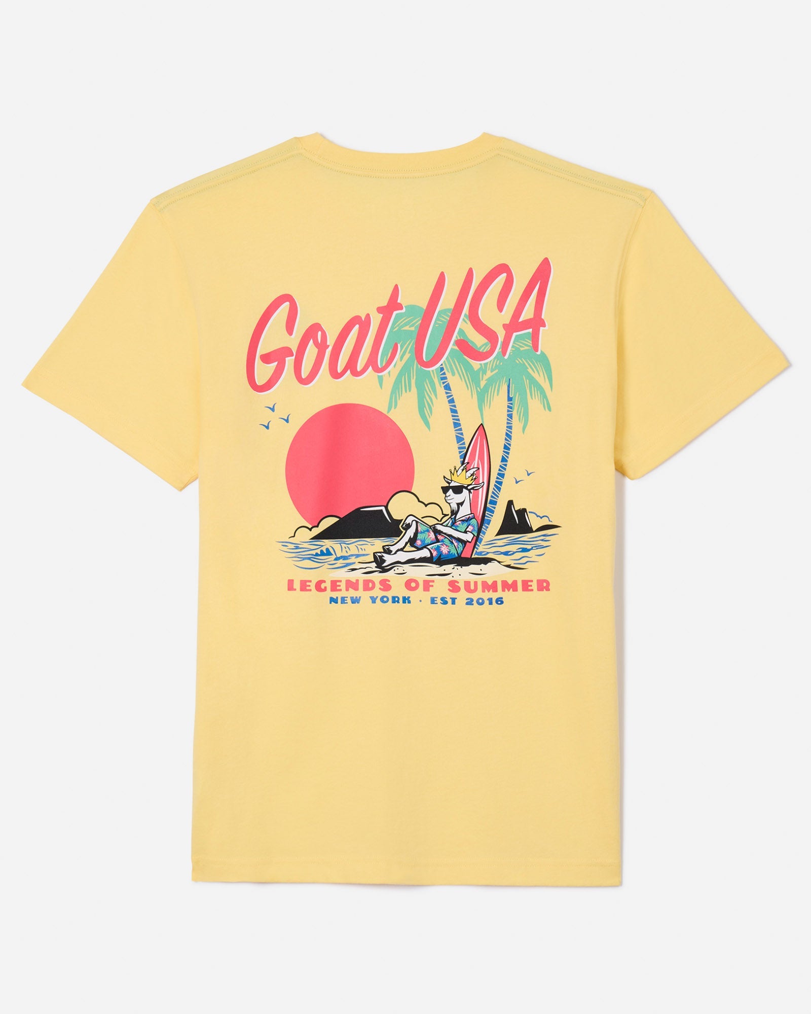 Back of banana cream t-shirt with goat laid up on a surfboard in a tropical beach setting#color_banana-cream