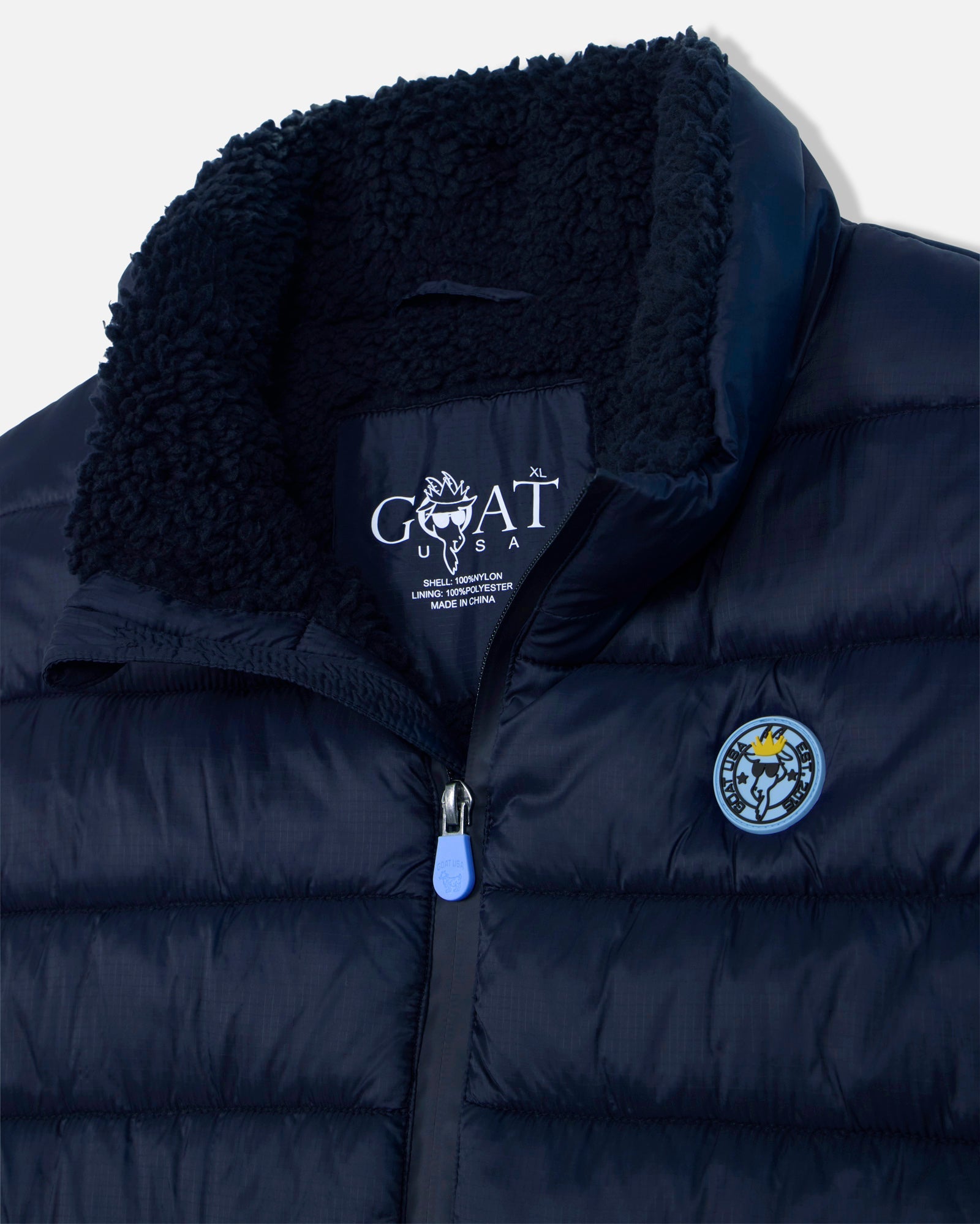 Open collar of dark navy Men's Puffer Fleece Vest#color_dark-navy