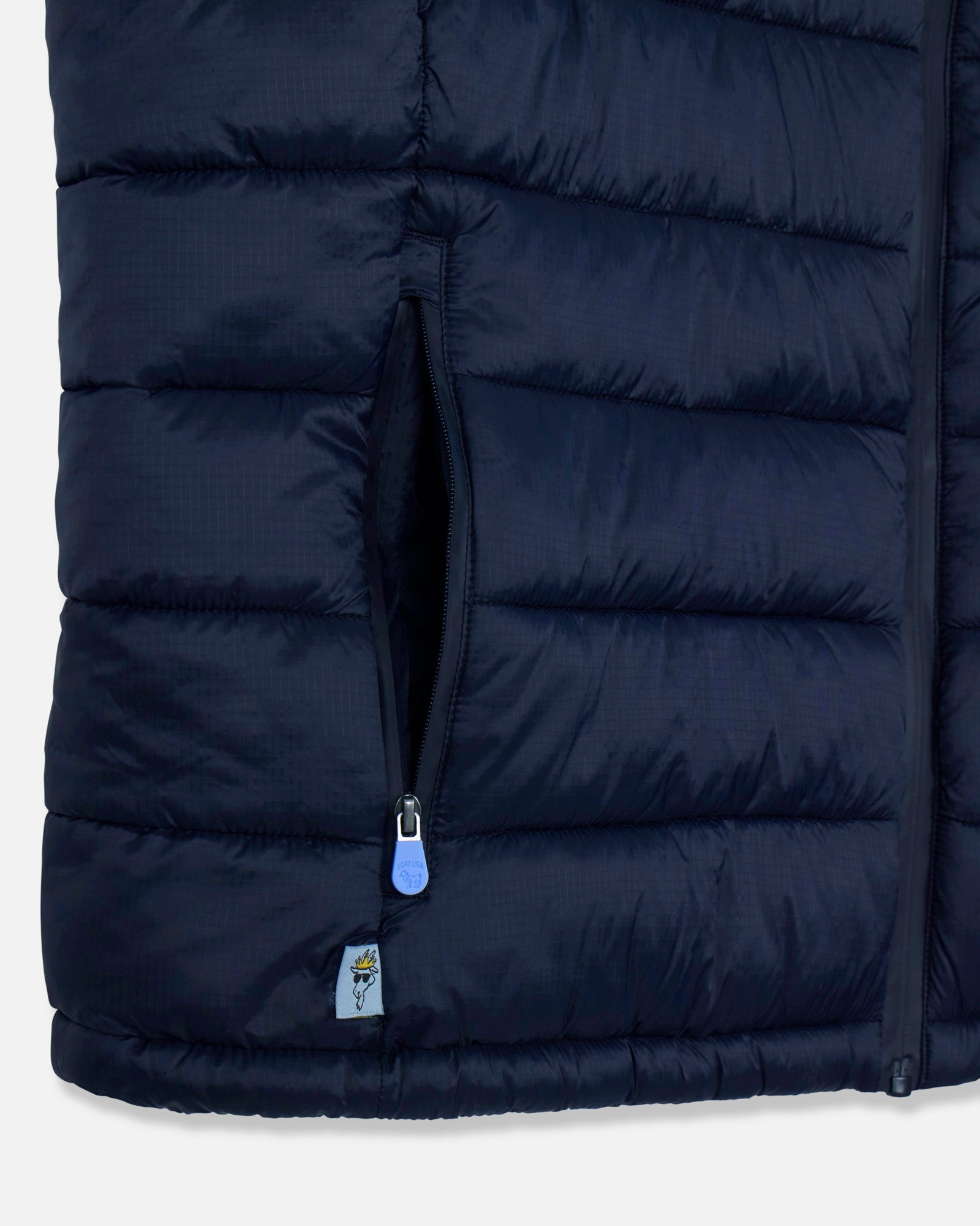 Pocket of dark navy Men's Puffer Fleece Vest#color_dark-navy