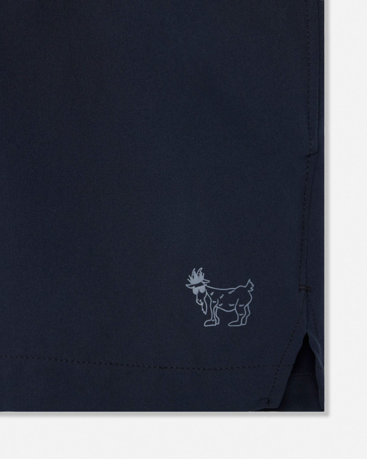 Black fabric with a small embroidered logo on a white background#color_black
