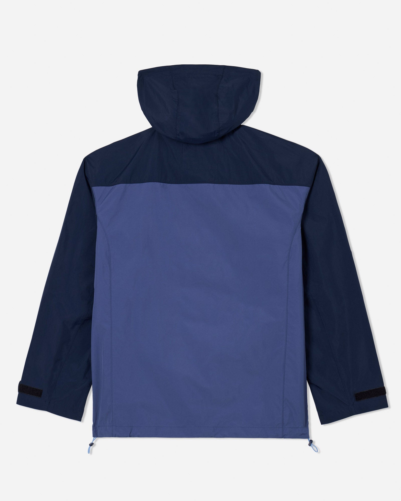 Back of navy windbreaker laid down