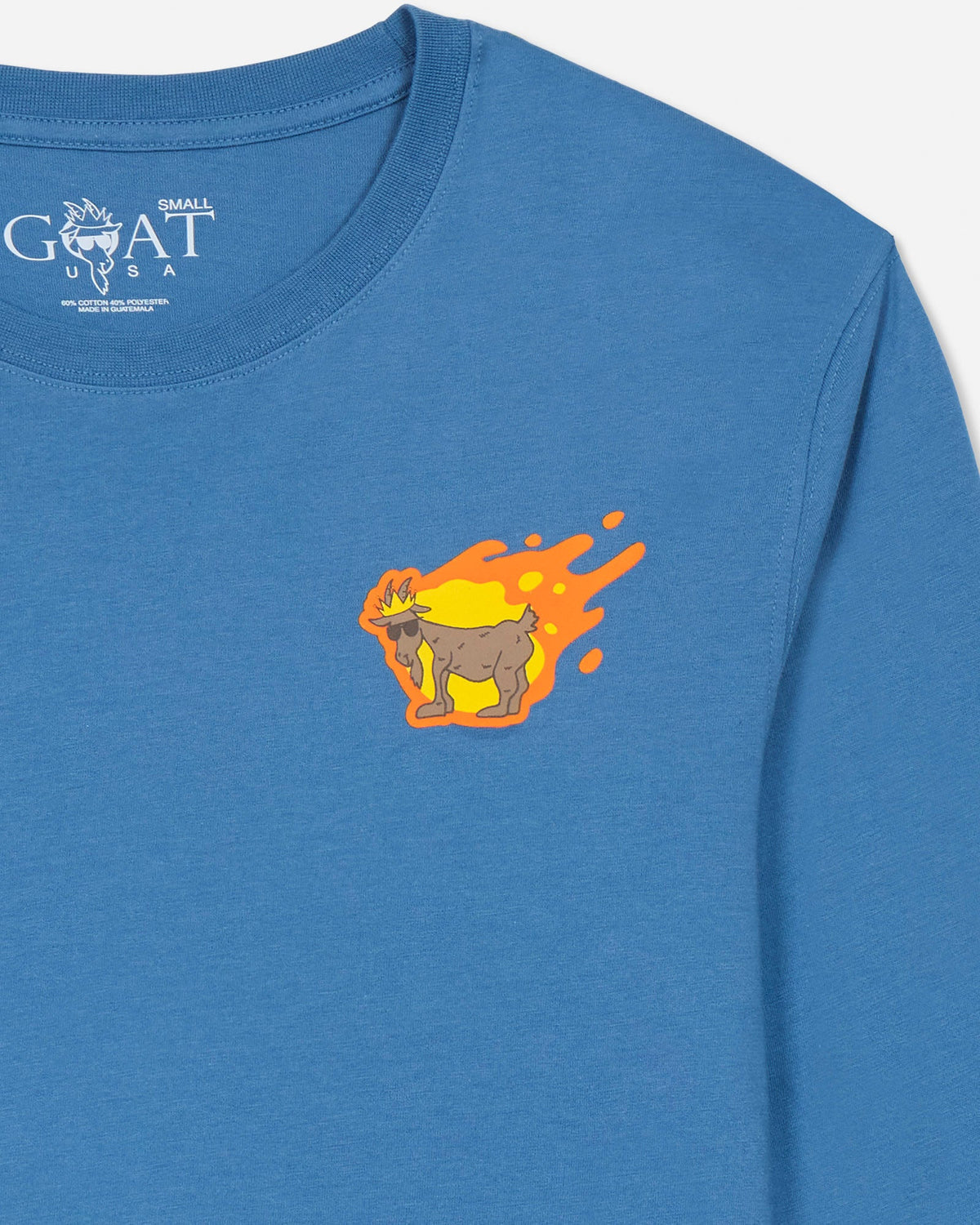 Blue long-sleeve shirt with a graphic of a goat and flames on a light gray background