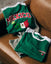 Green shirts with 'Mexico' text on a brown couch