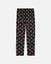 Black pajama pants with colorful pattern on a light gray background