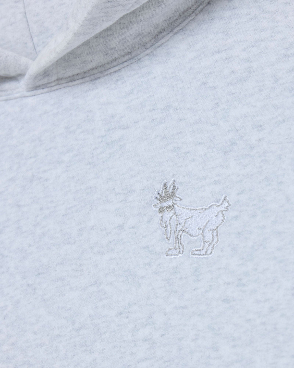 Light gray hoodie with a subtle embroidered design on the chest.