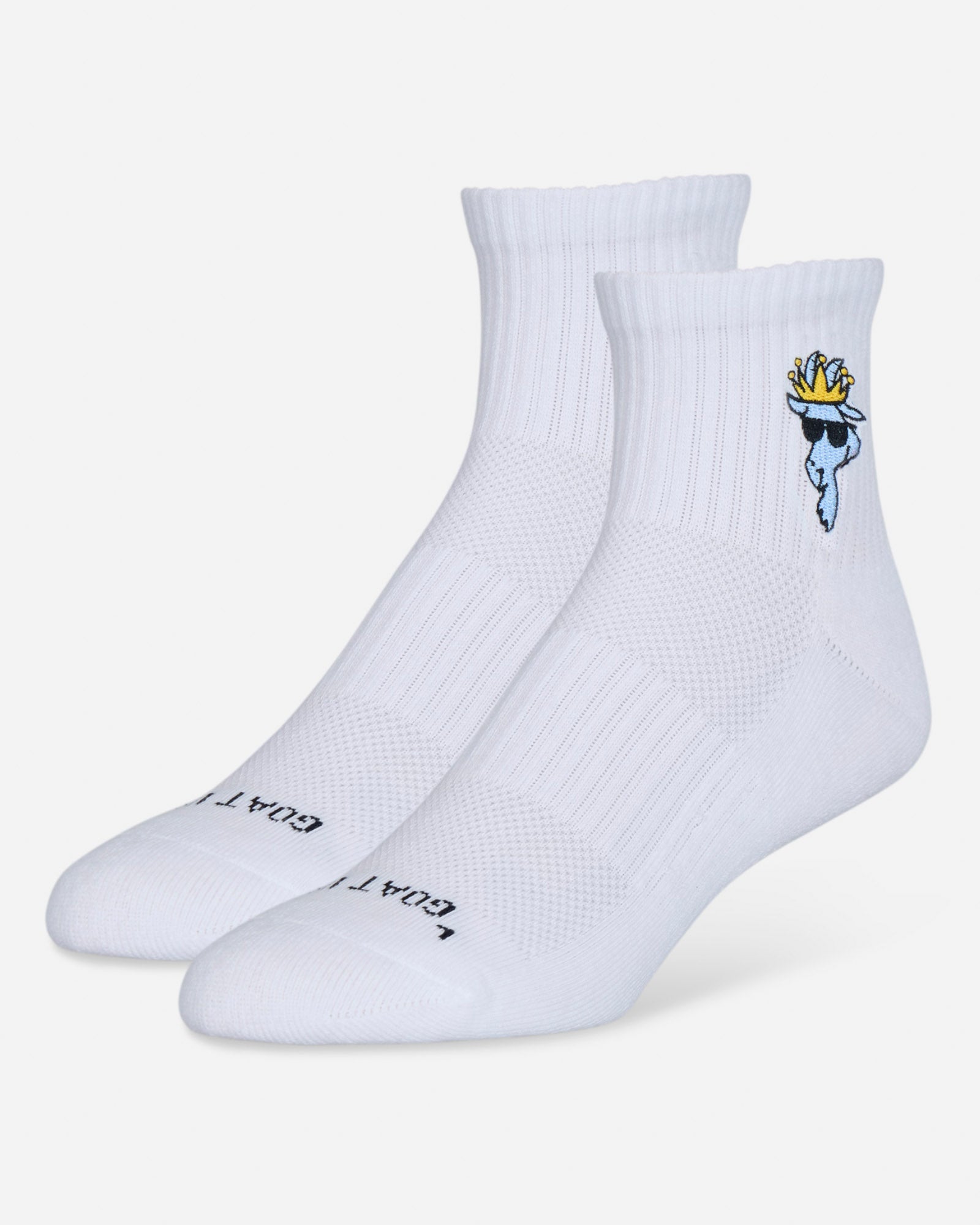 White socks with a cartoon character design on a light gray background