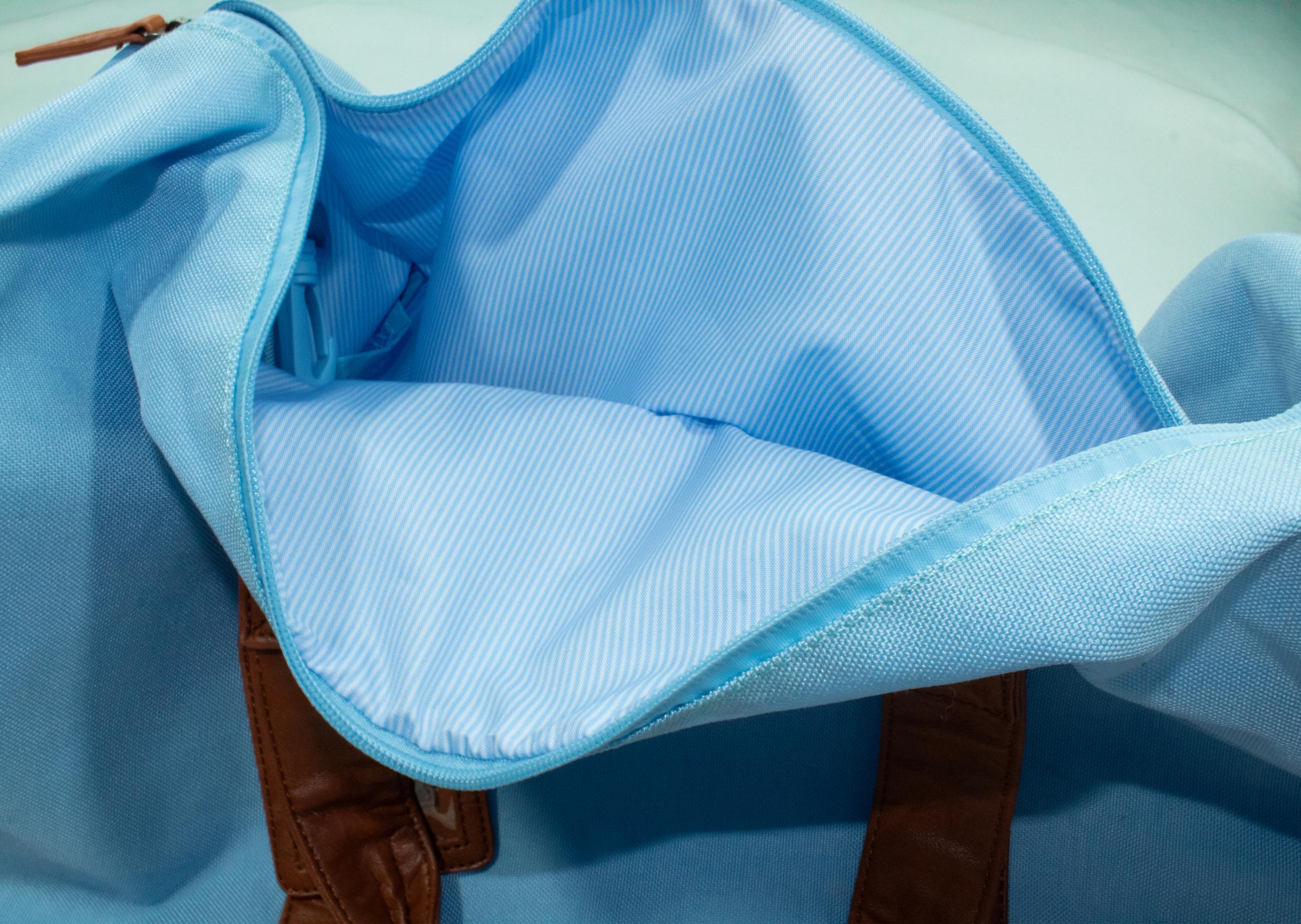 Inside of carolina blue OG Duffel Bag#color_carolina-blue
