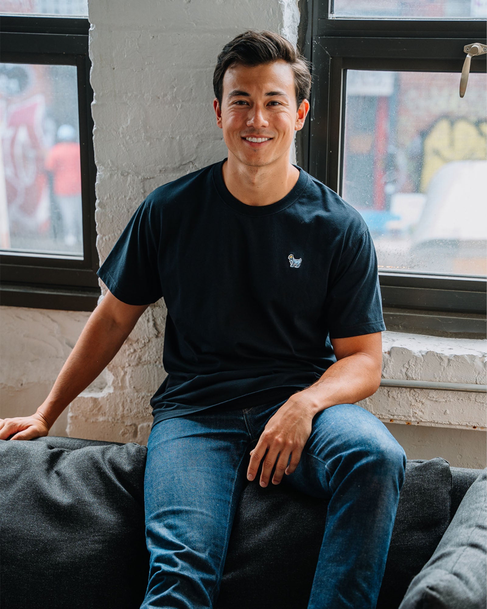 Model wearing black OG Embroidered T-Shirt#color_black