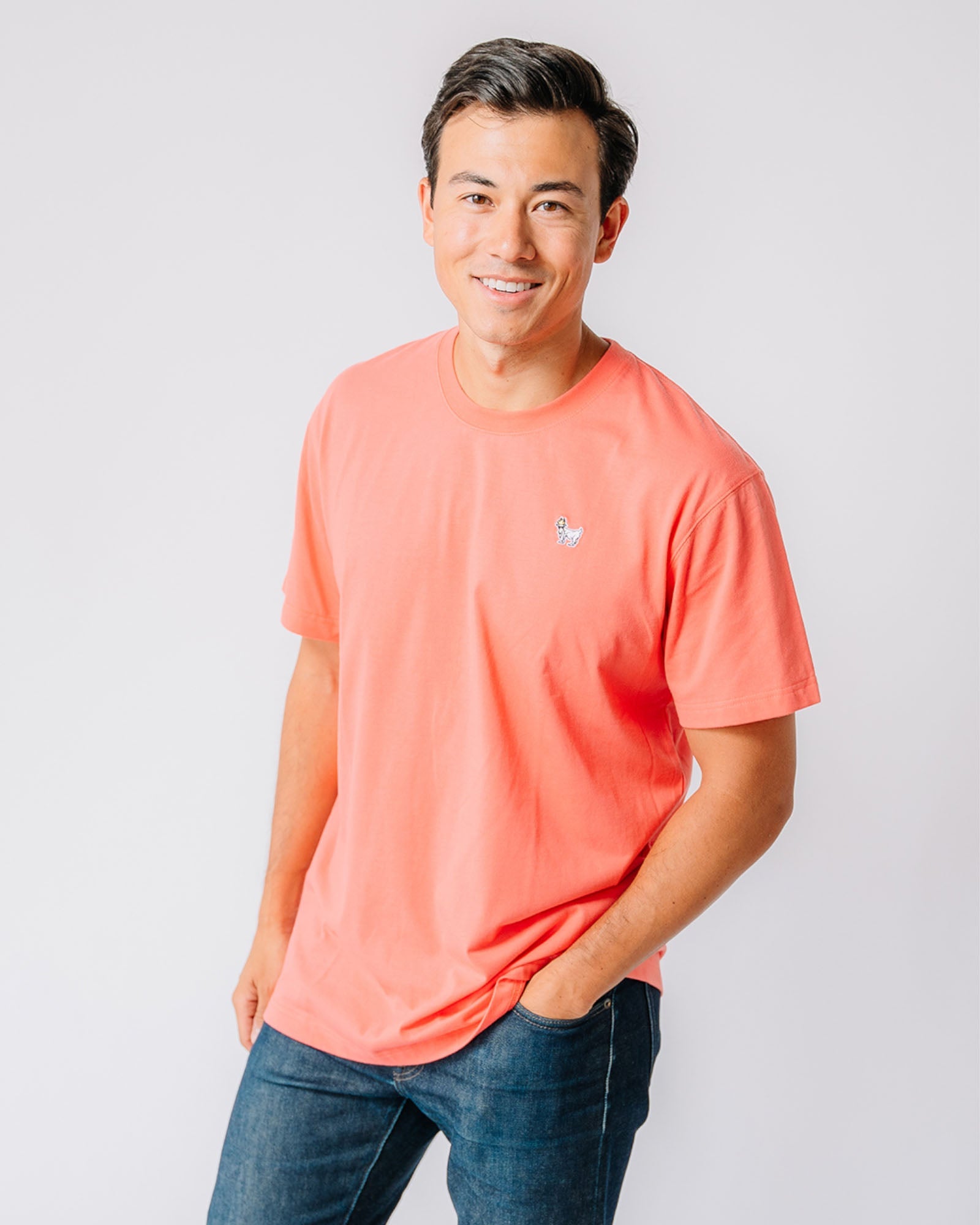 Model wearing salmon OG Embroidered T-Shirt#color_salmon