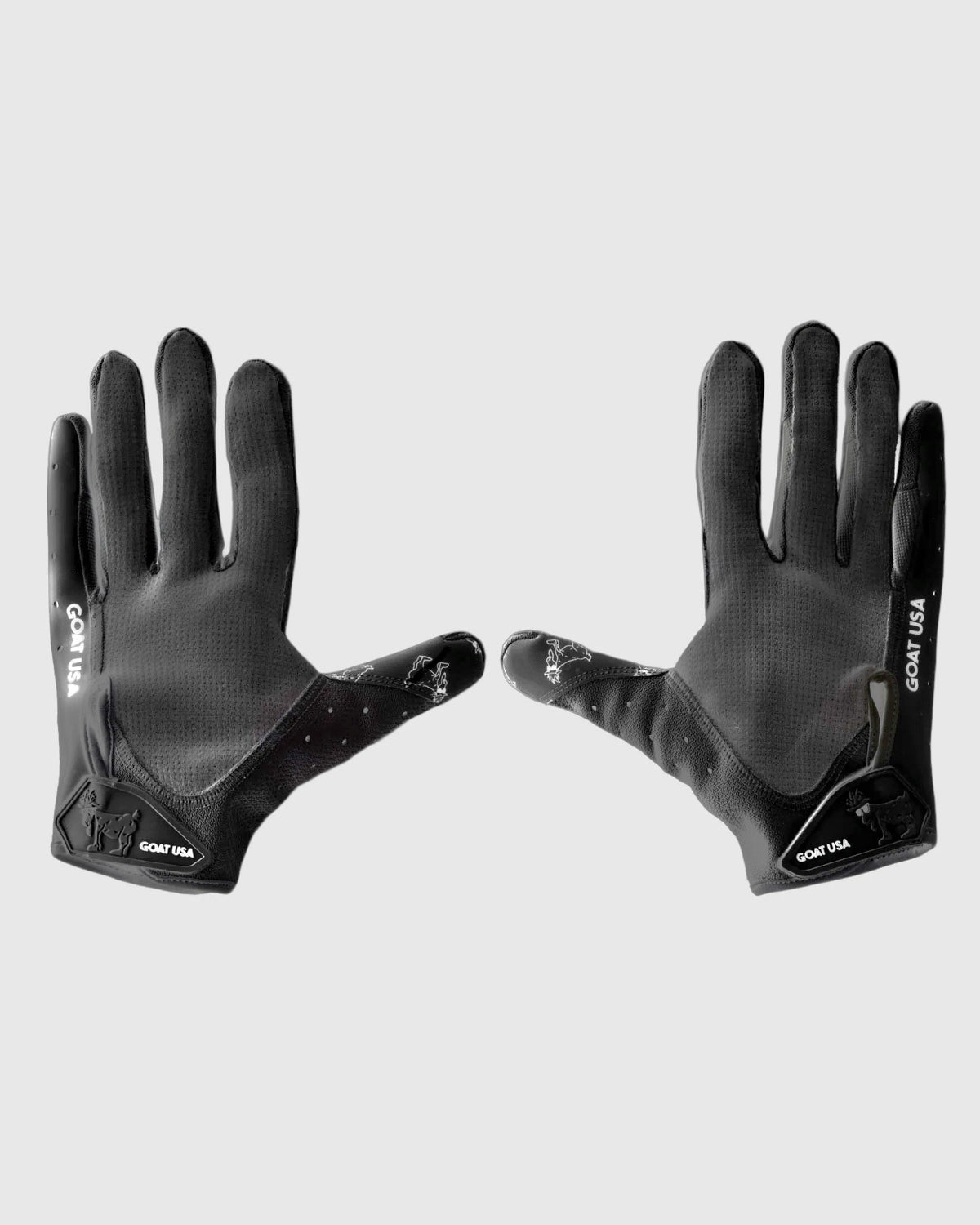 Backs of black football gloves