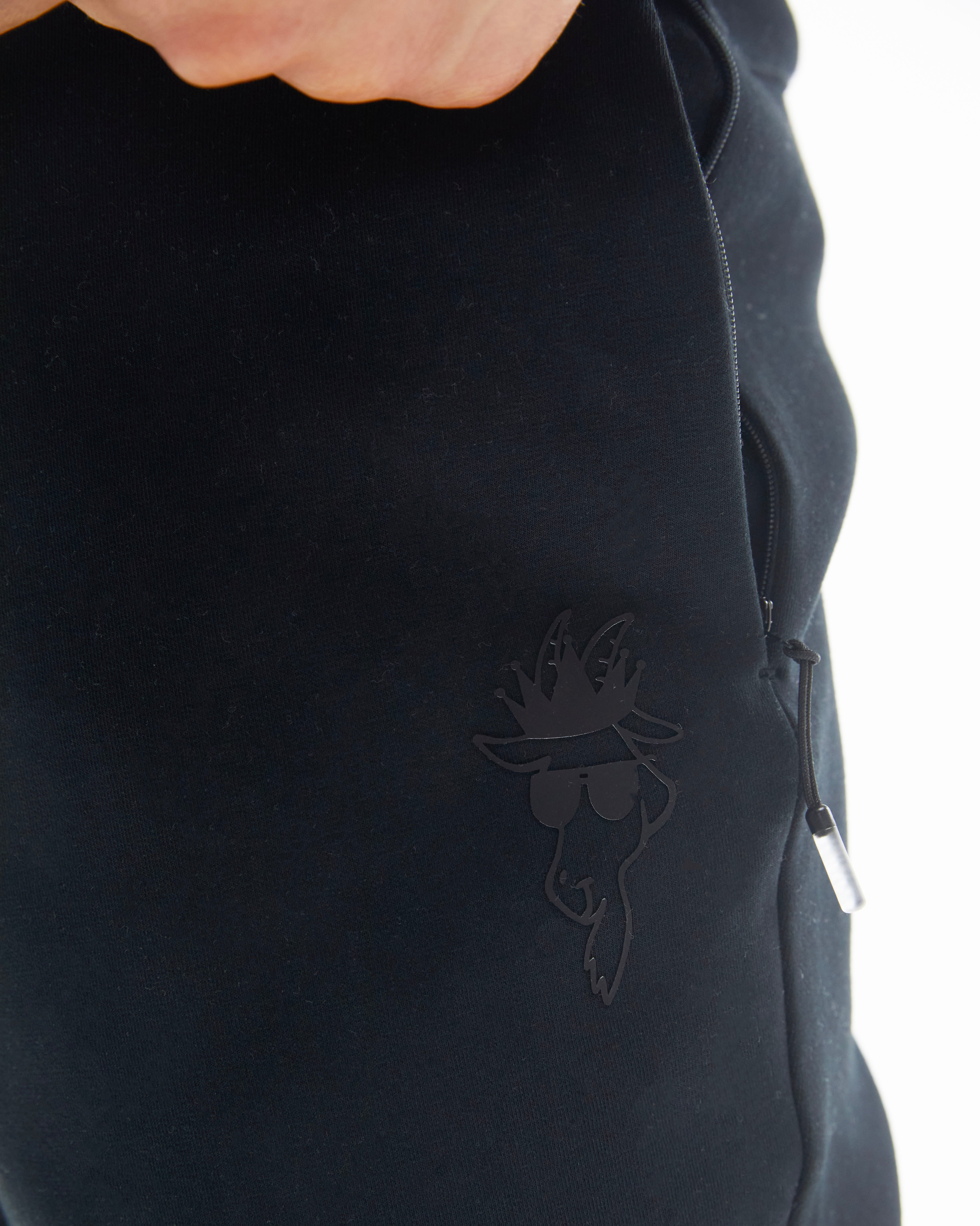 close up of pocket of performance jogger#color_black