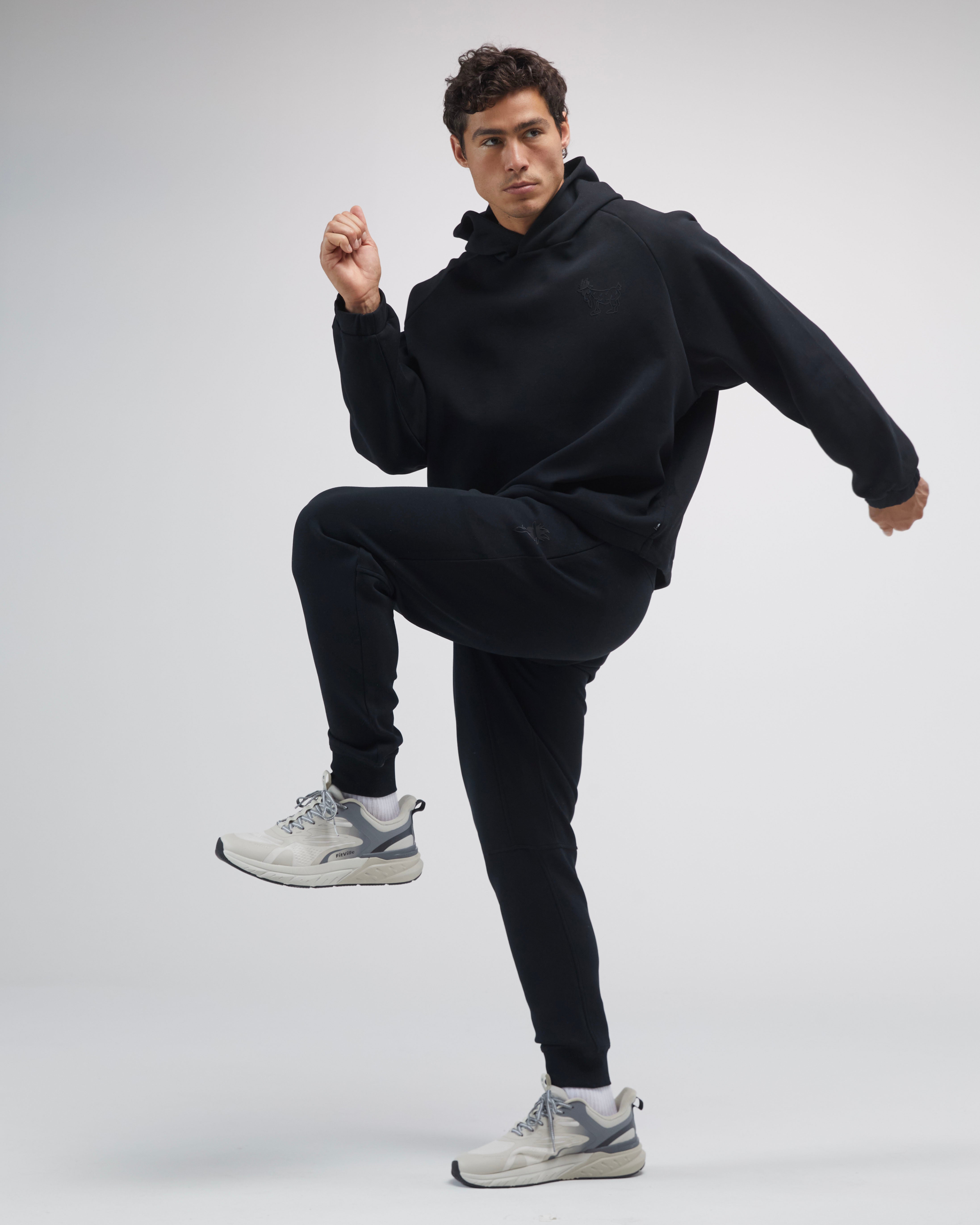 Black performance joggers on model#color_black