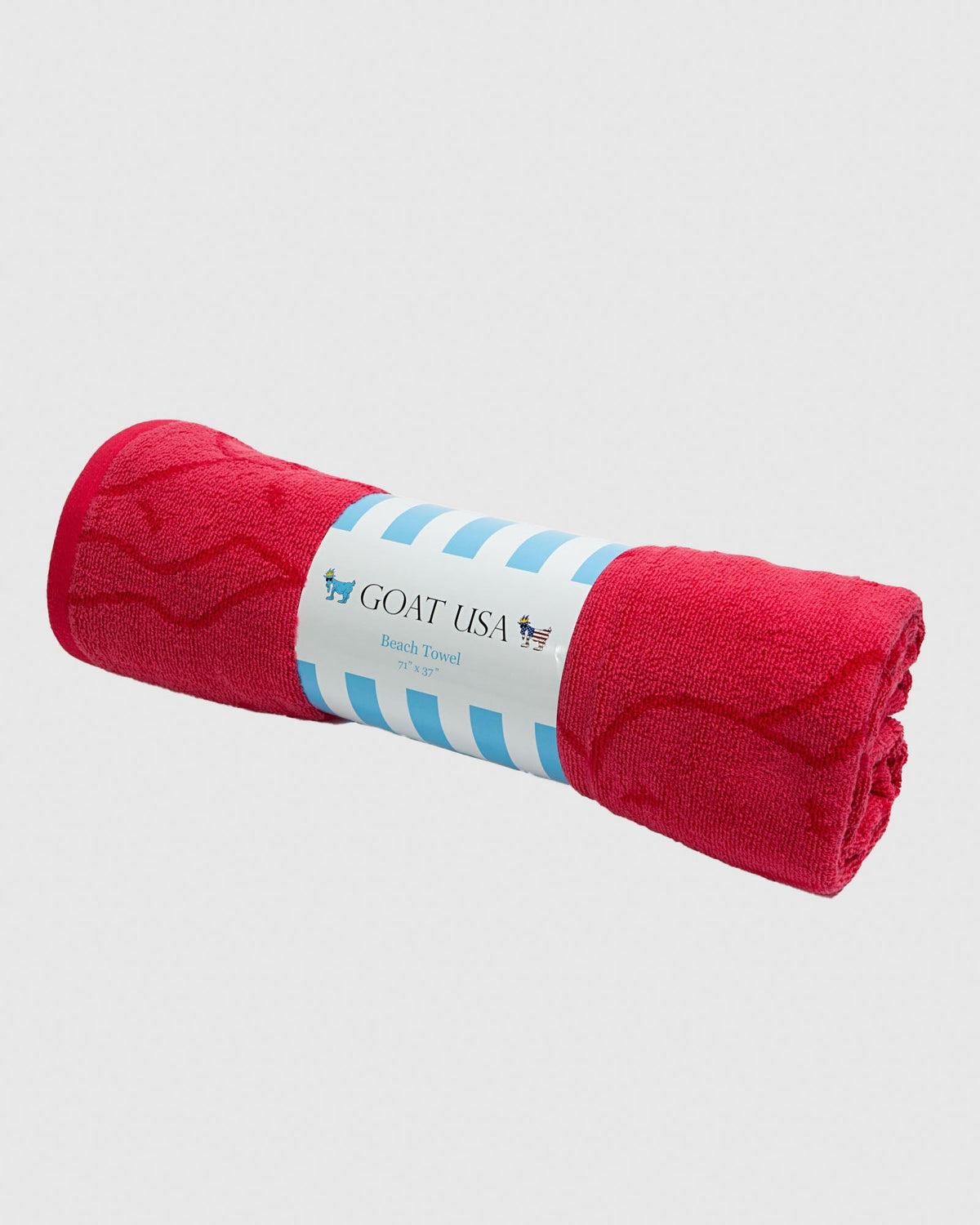 Rolled up salmon beach towel
