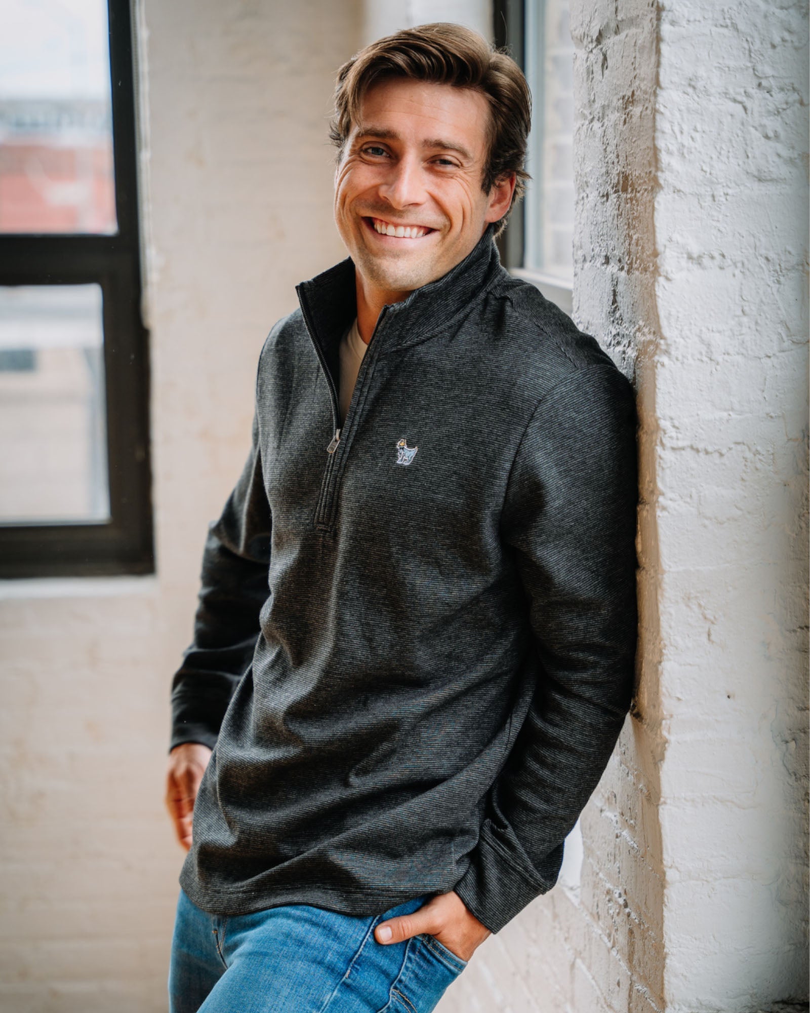 Model wearing black OG Roosevelt Men's 1/4 Zip#color_black