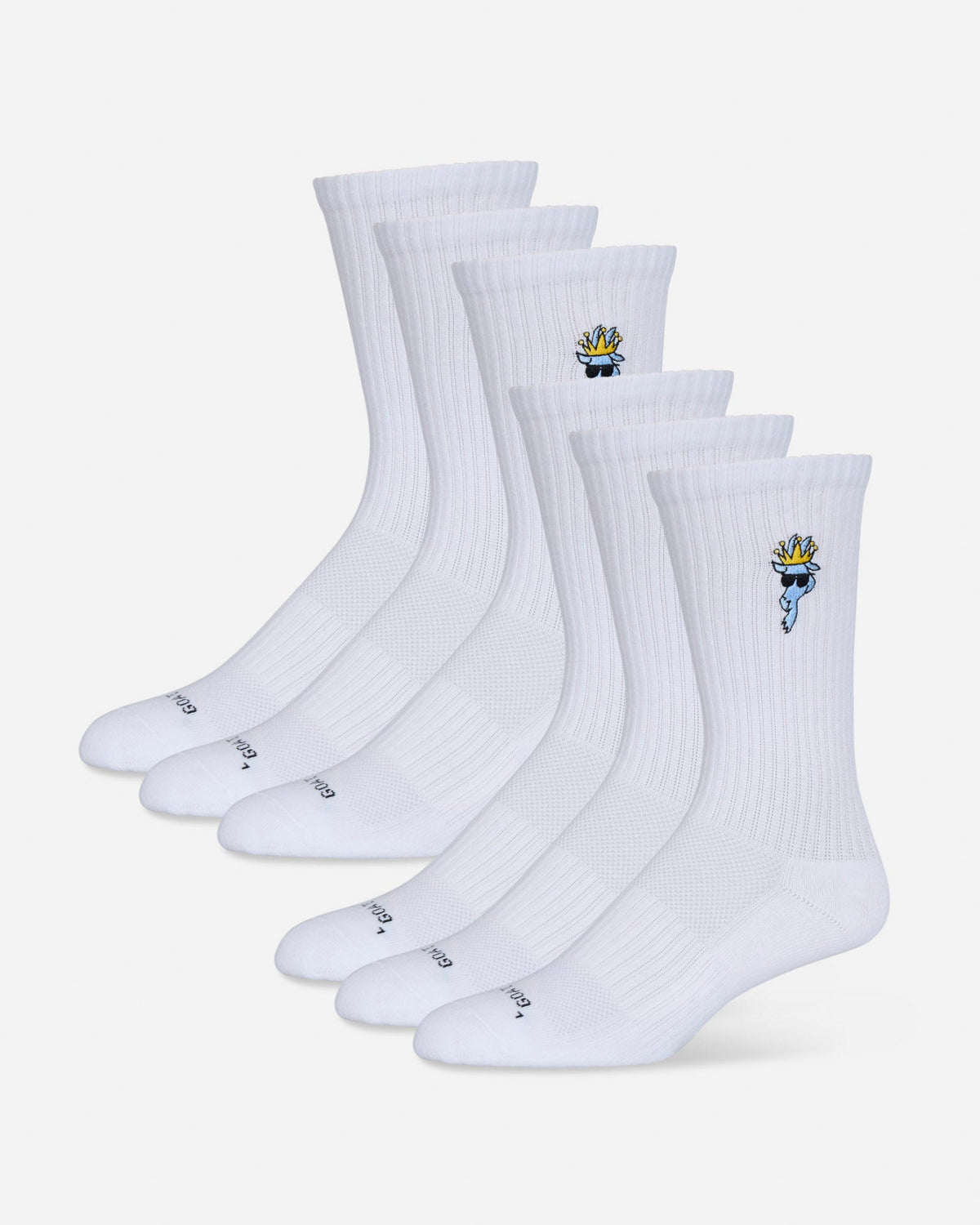 Set of white socks with small embroidered designs on a light gray background