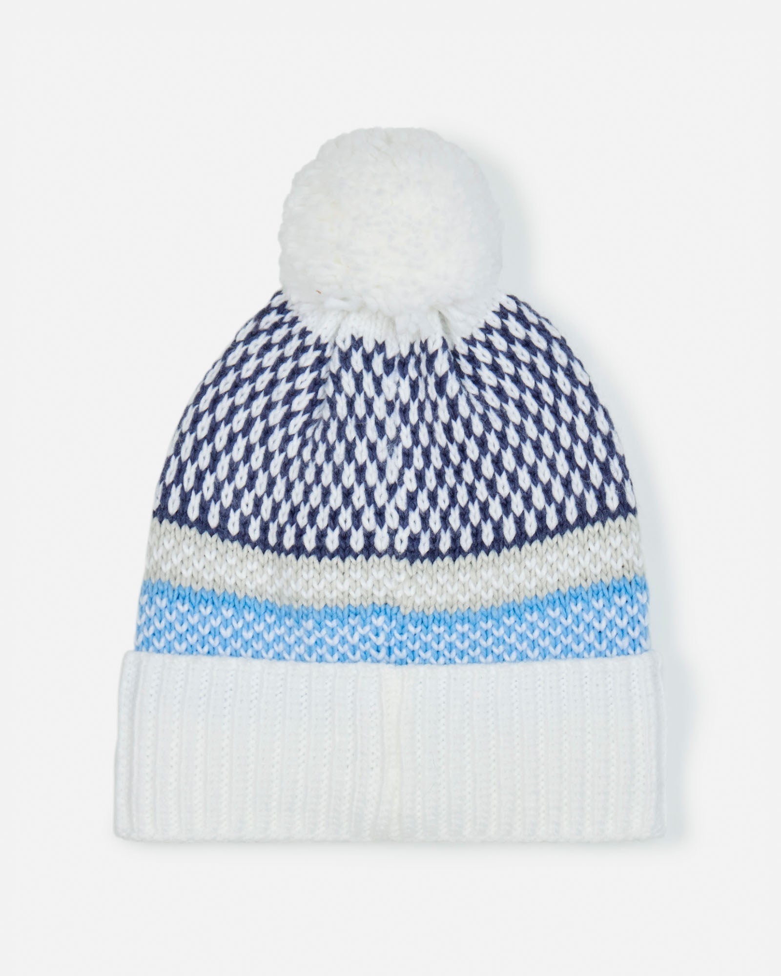 Knitted hat with a white pom-pom on a light gray background