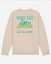 Beige sweatshirt with pickleball graphic and text on a light gray background