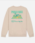 Beige sweatshirt with pickleball graphic and text on a light gray background