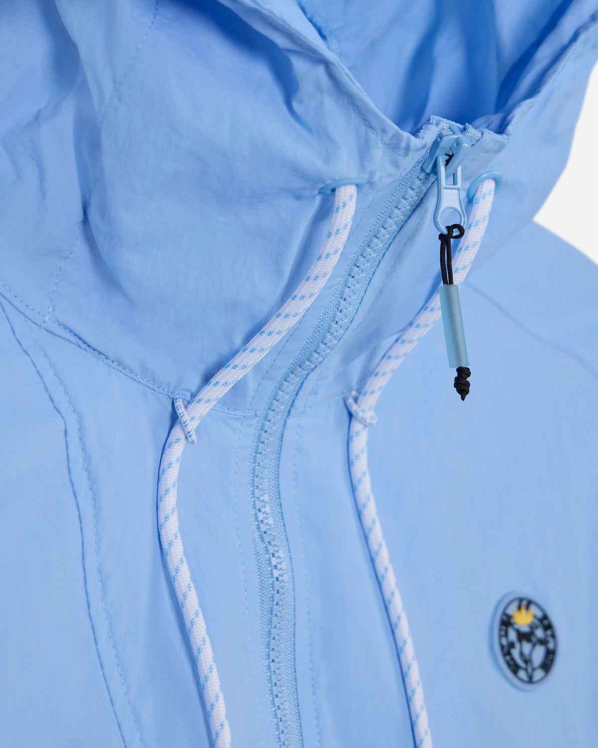 Close-up of carolina blue windbreaker