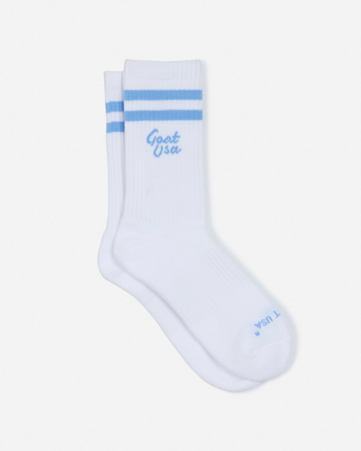 Laid out pair of socks with light blue stripes#color_carolina-blue