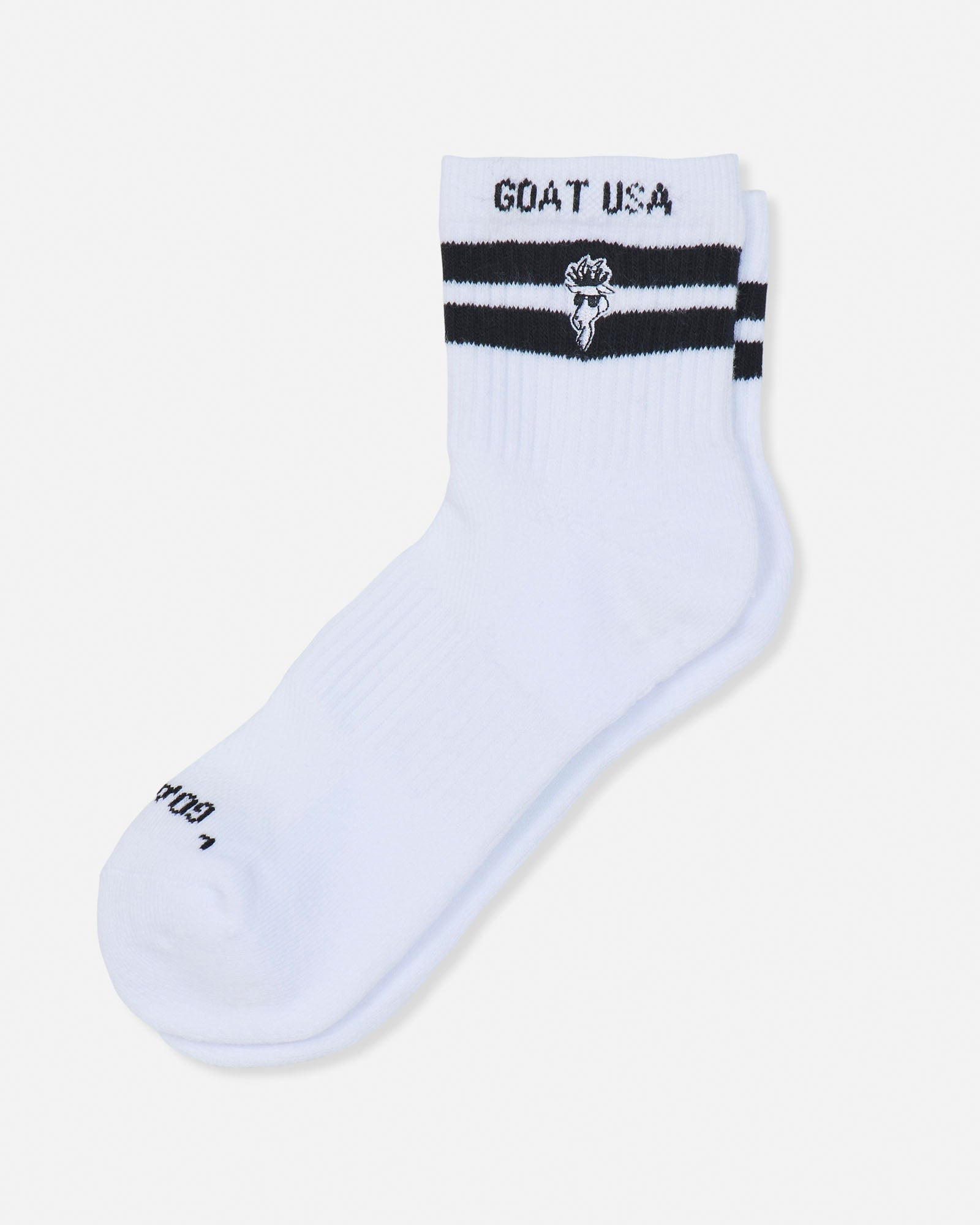 A single white crew sock with black stripes and 'GOAT USA' text on the cuff, displayed on a light gray background.#color_white
