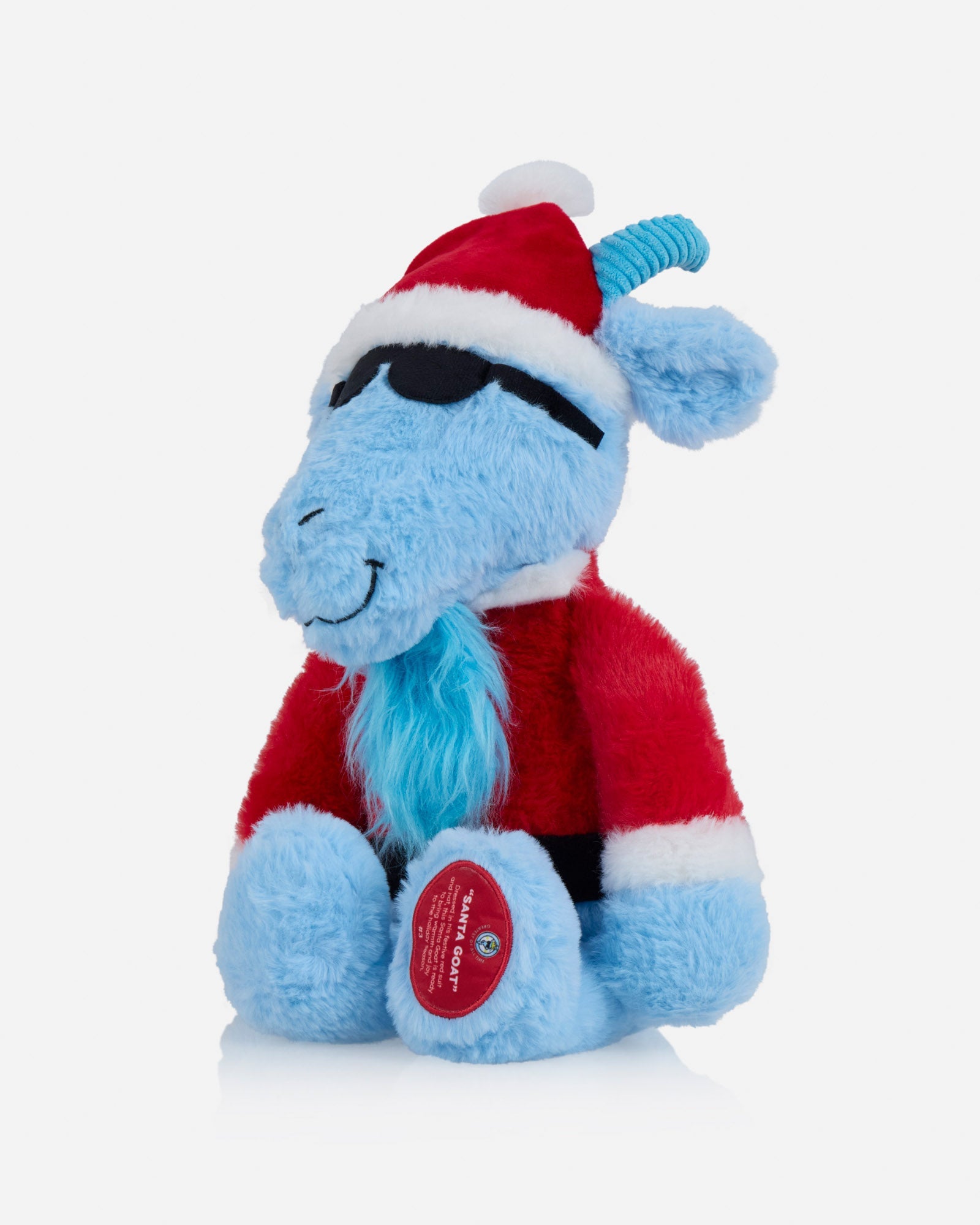 Blue plush toy with a Santa hat and red outfit on a light gray background