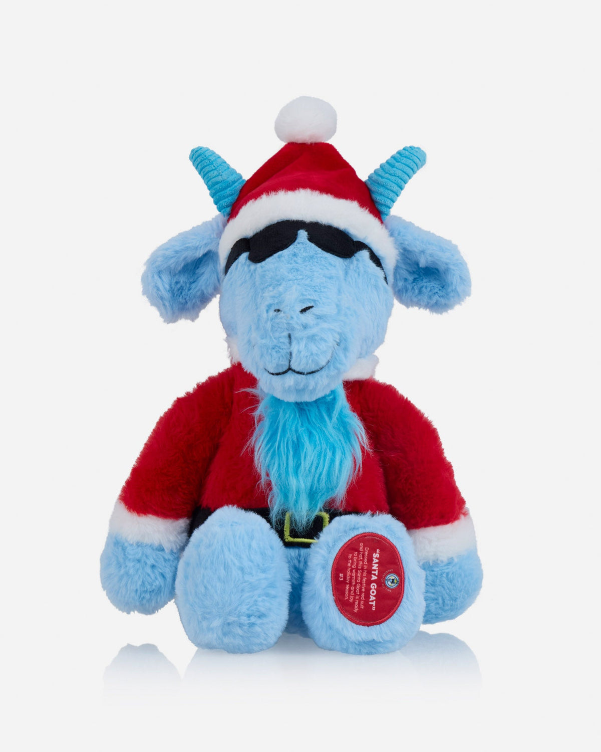 Blue plush toy with a Santa hat on a light gray background