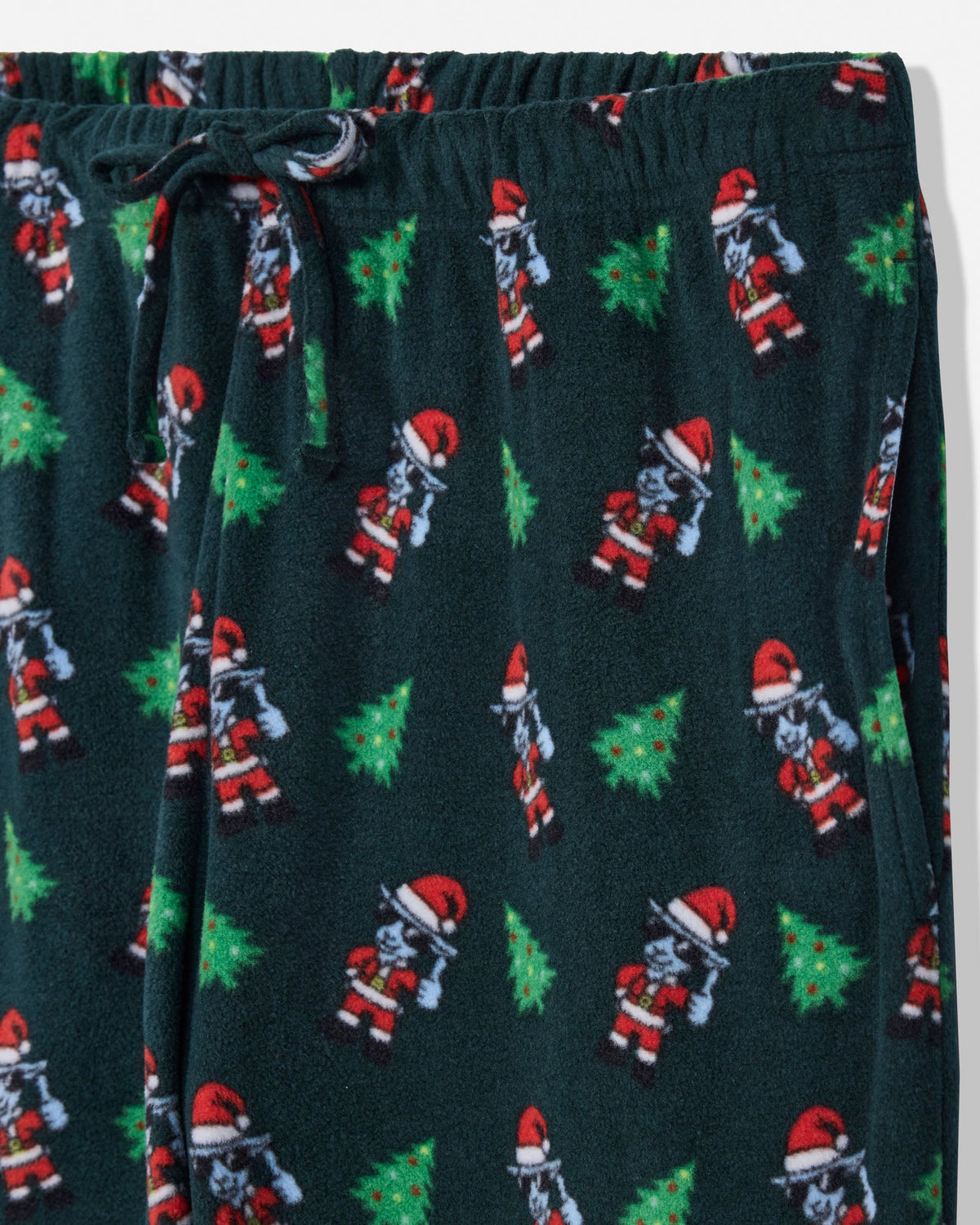 Dark green fleece pajama pants featuring an all-over Christmas print of Santa Claus goats and green Christmas trees, with an elastic drawstring waistband.
