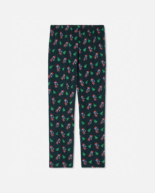 A pair of dark green pajama pants with an all-over Christmas pattern featuring Santa Claus and green Christmas trees, shown flat against a light gray background.