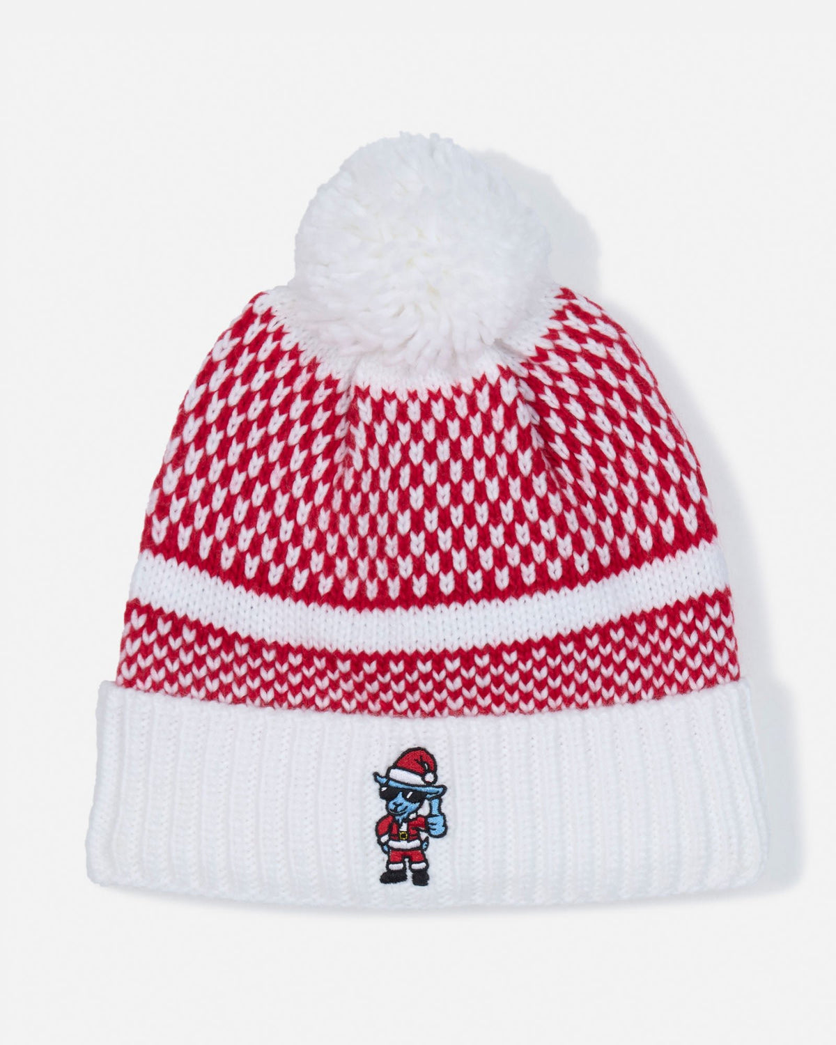 A red and white patterned knit beanie with a white pom-pom on top and a white ribbed cuff, featuring a small embroidered cartoon character wearing a Santa hat on the front.