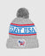 Winter hat with pom pom and goat in American-themed winter attire