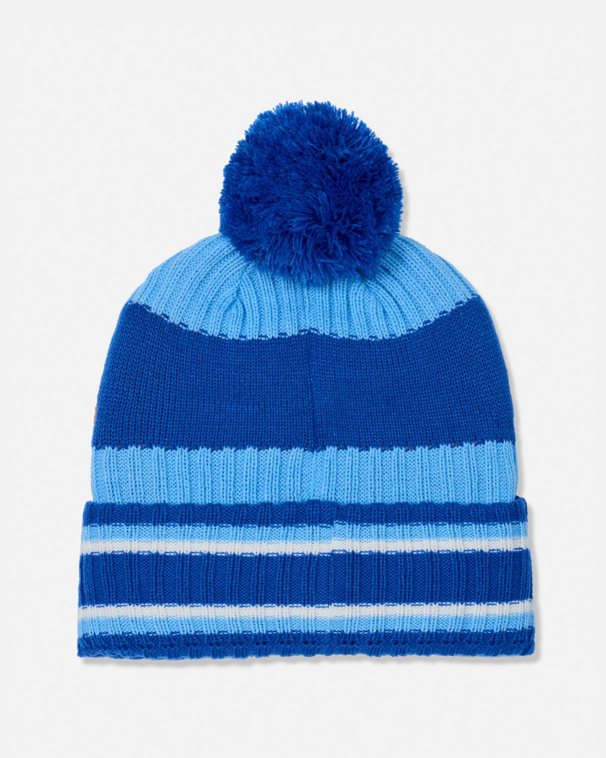 A blue and light blue striped knit beanie with a fluffy pom-pom on top, shown against a plain white background.