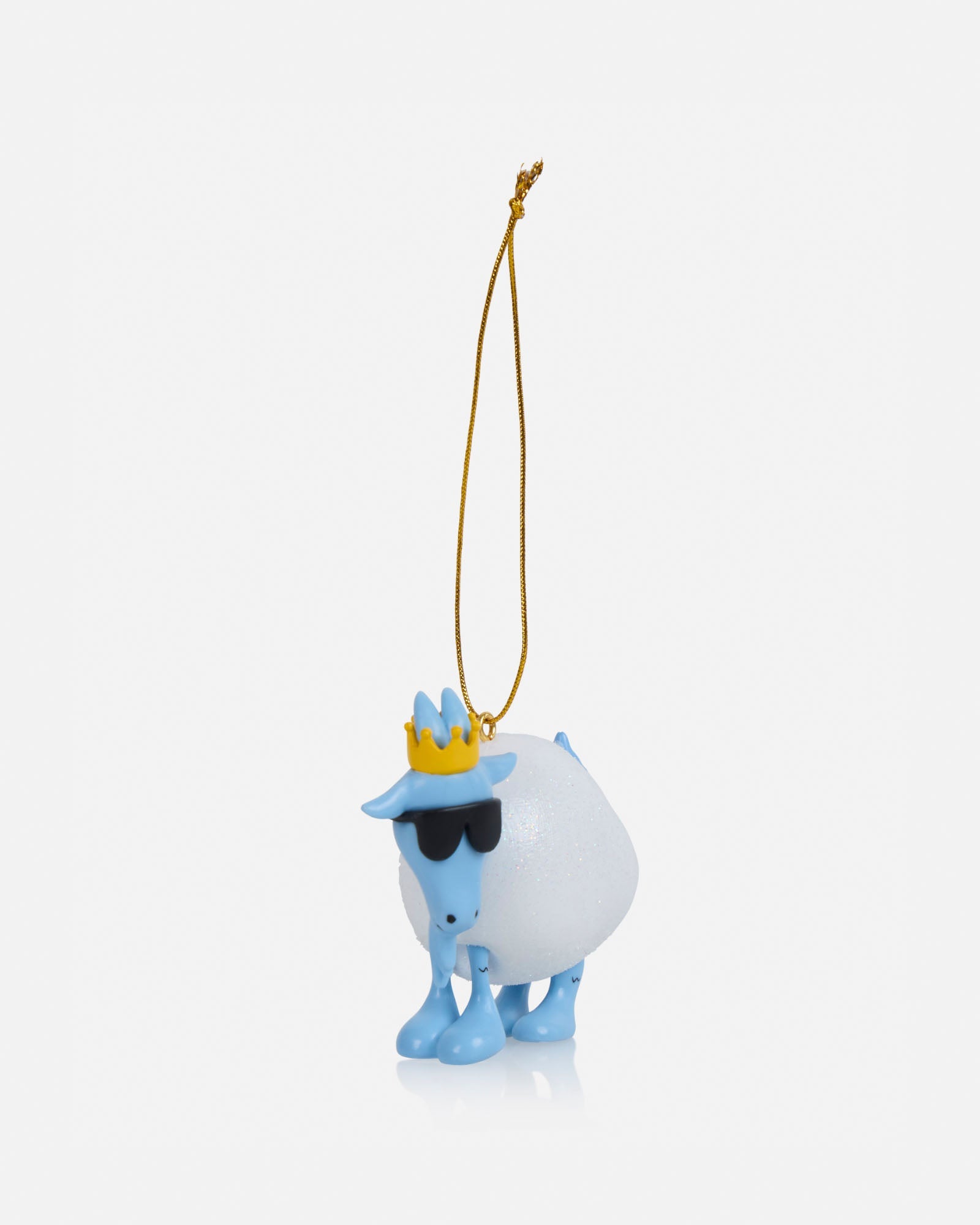 Decorative goat ornament with a crown on a white background
