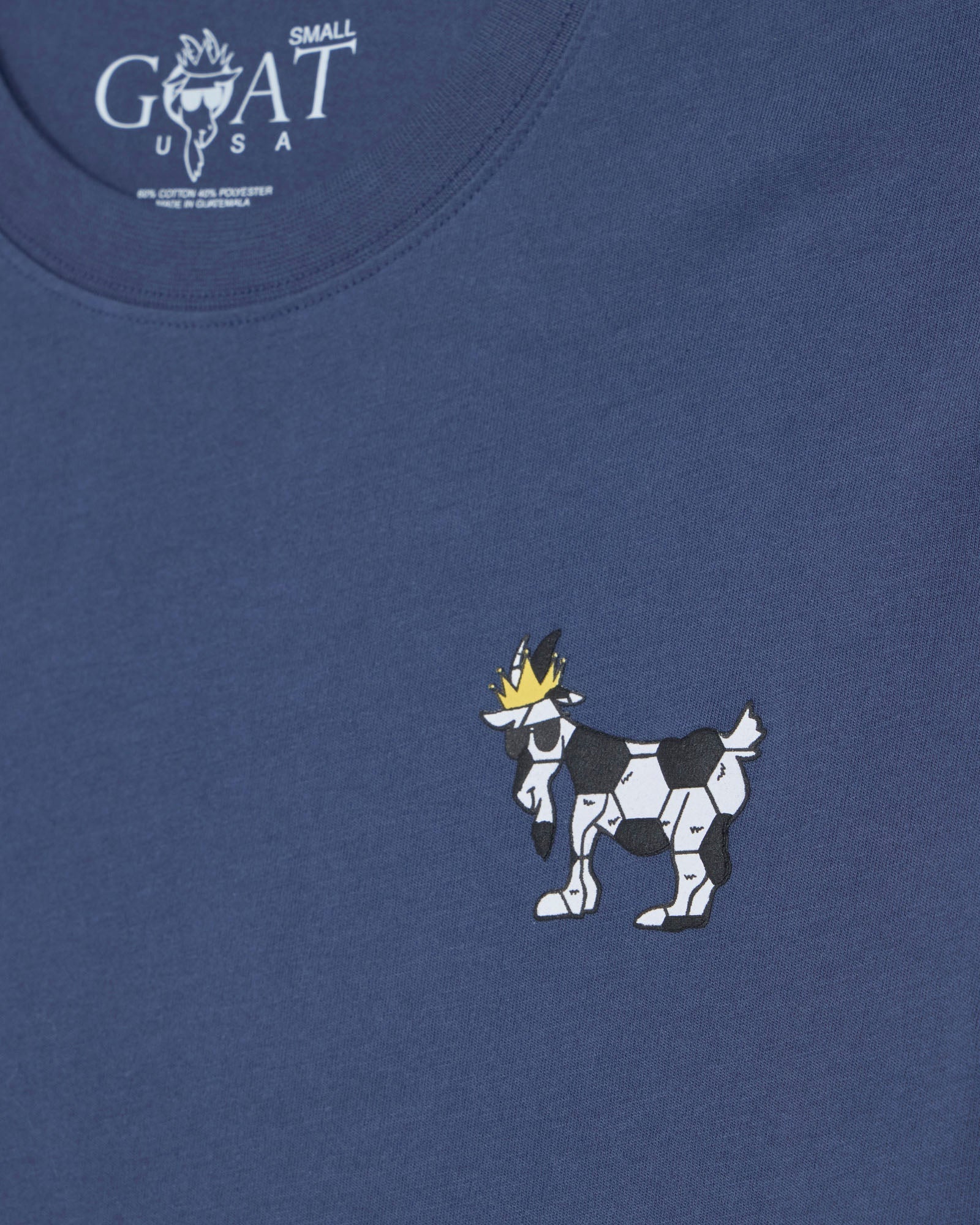 Blue t-shirt with a goat graphic and 'Small Goat USA' text on a blue background