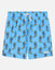 Blue swim shorts with cartoon character pattern on a light gray background