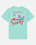 Mint t-shirt with a colorful graphic and text on a light gray background