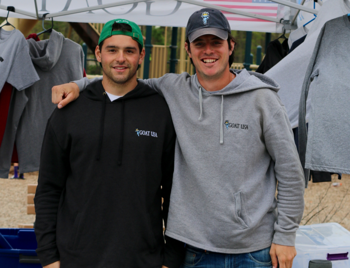 Two GOAT USA founders in branded hoodies