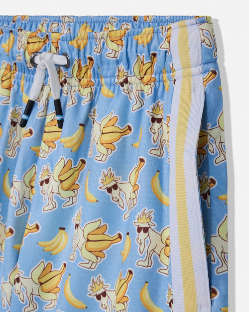 Close-up of light blue drawstring shorts with an all-over print of dancing bananas and cartoon figures, plus a white and yellow side stripe.