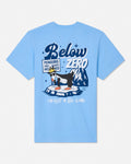 A light blue short-sleeve t-shirt with a graphic print on the front featuring a penguin on ice with the text 'Below Zero' and 'Penguins Only GOATS Welcome'.