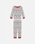 A long-sleeve matching pajama set with a festive Nordic goat print, featuring black and red goat motifs on a white background with red cuffs and collar.
