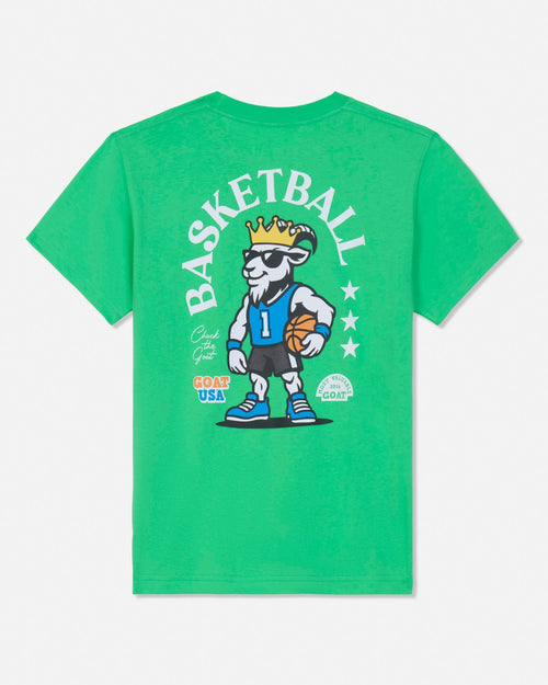 A bright green short-sleeve t-shirt with a large graphic on the back featuring a cartoon basketball goat wearing a crown and sunglasses, surrounded by the word 'BASKETBALL' in arched white letters.