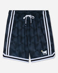 Black athletic shorts with a subtle geometric pattern, featuring white side stripes, a white drawstring, and a small white goat logo with a yellow flower on the lower left leg.