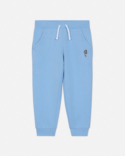 Light blue sweatpants with a small logo on a light gray background