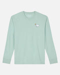 A light mint green long-sleeve crewneck t-shirt by GOAT USA, featuring a small white cartoon goat wearing a gold crown on the left chest, displayed on a clean light gray background.