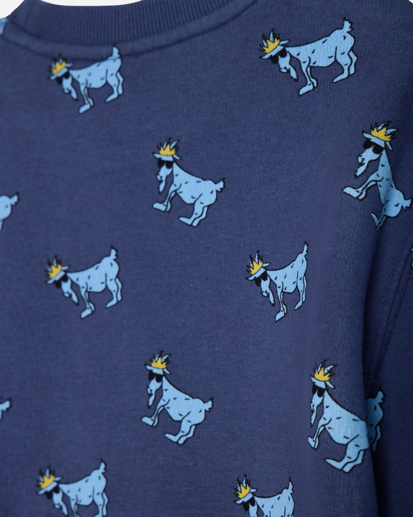 Close-up of navy crewneck with blue goats#color_navy