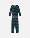 A two-piece children's pajama set featuring a long-sleeve top and matching pants in dark teal green with an all-over festive print of Santa Claus, Christmas trees, and snowflakes, displayed flat against a light gray background.