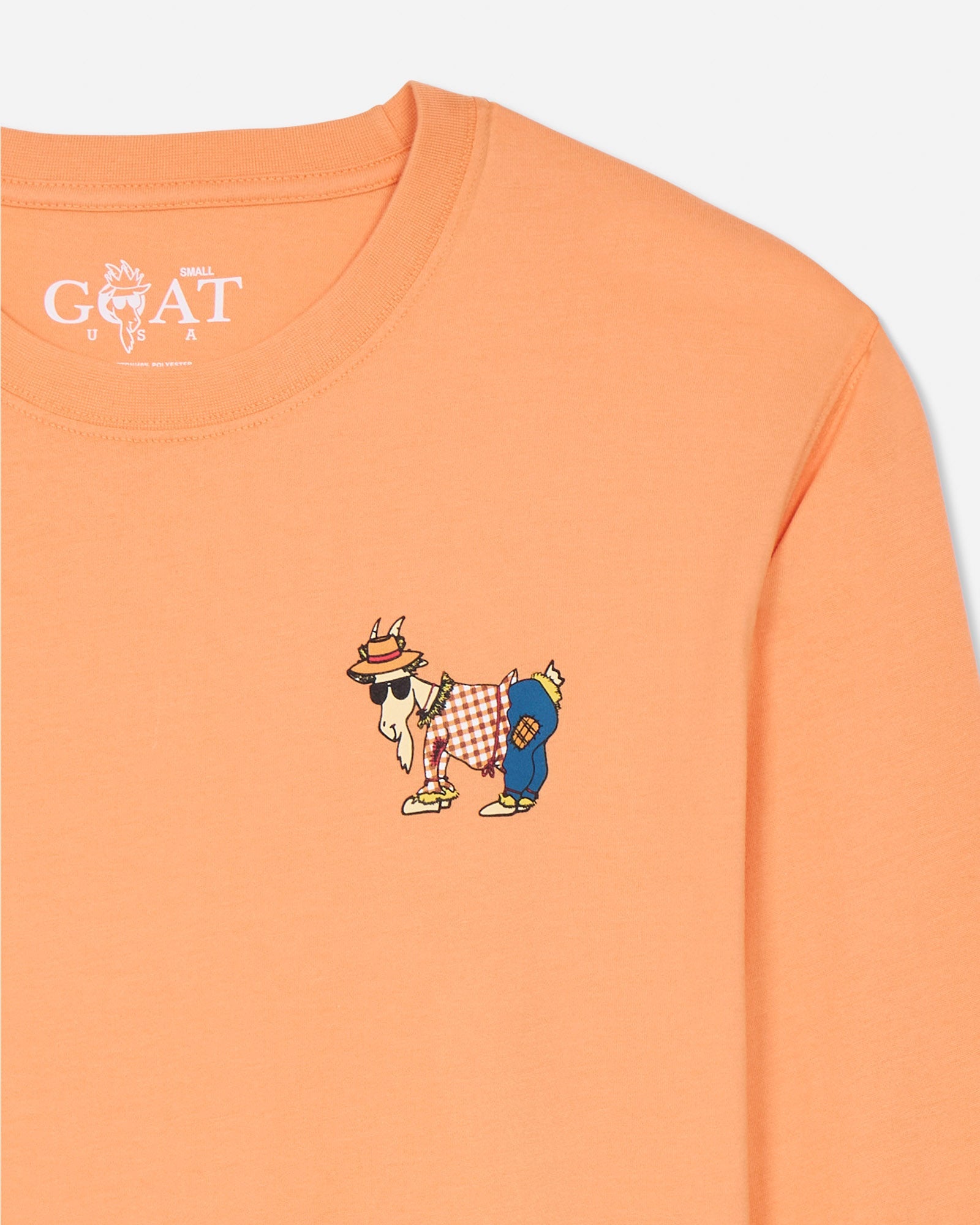 Orange sweatshirt with a cartoon goat design on a light gray background