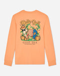 Orange long-sleeve shirt with a graphic of a scarecrow goat and pumpkins and 'Hello Fall' text on a light graybackground.