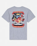 A heather gray short-sleeve t-shirt shown from the back, featuring a large graphic print of a cartoon goat wearing a crown and sunglasses, with red banners reading 'GOAT USA' and 'SUPPORT THE BRAVE'.